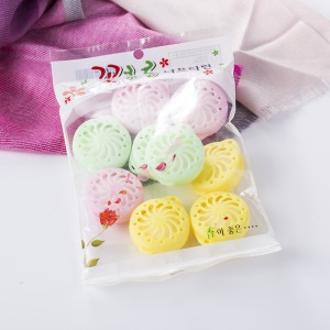 Parfum en boules aromatiques désodorisantes pour toilettes