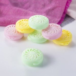 Parfum en boules aromatiques désodorisantes pour toilettes