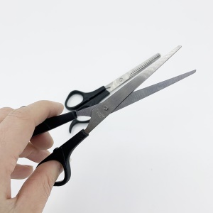 Ciseaux de coiffure noir plat