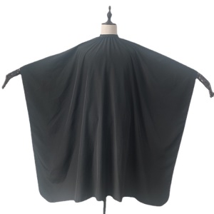 Tablier de coiffure imperméable et anti-adhésif