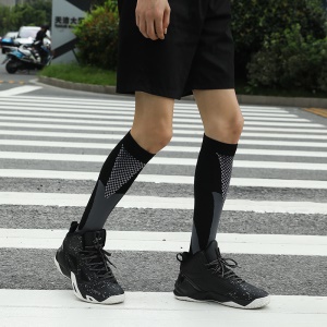Chaussettes long de compression d'extérieur en maille respirant et évacuant la transpiration