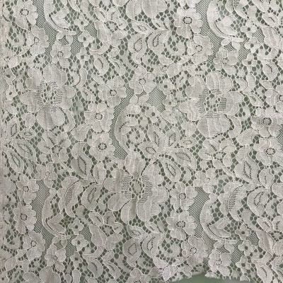 Tissu en dentelle Brodé