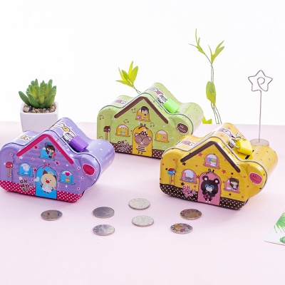 Petite tirelire  en métal en forme  de maison