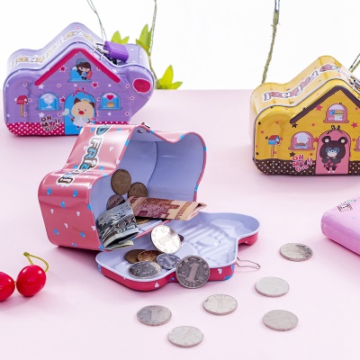 Petite tirelire  en métal en forme  de maison
