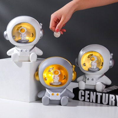 Tirelire pour la veilleuse astronaute