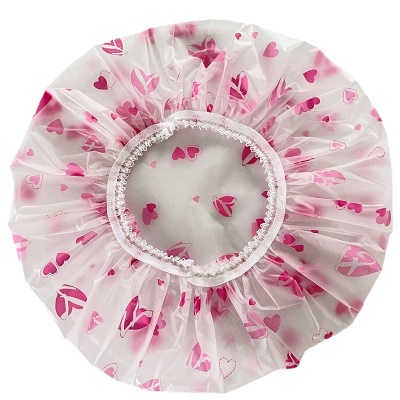 Bonnet de bain transparent à pois colorés