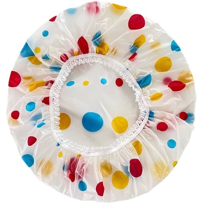 Bonnet de bain transparent à pois colorés