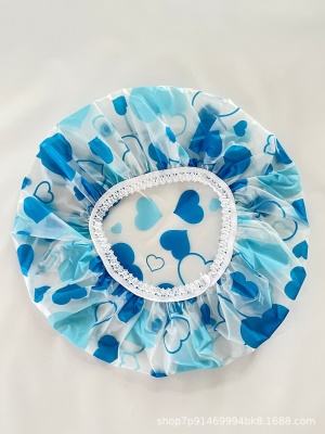 Bonnet de bain transparent à pois colorés