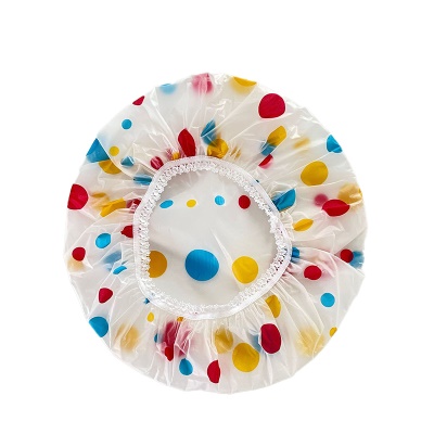 Bonnet de bain transparent à pois colorés
