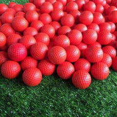 Balle de golf en caoutchouc synthétique