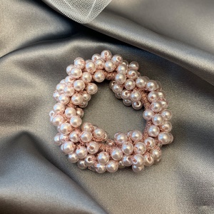 Attache de cheveux élastique et de perles