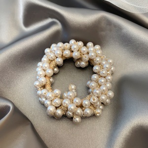 Attache de cheveux élastique et de perles