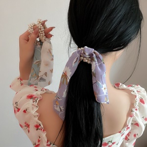 Attache cheveux incrusté de perles