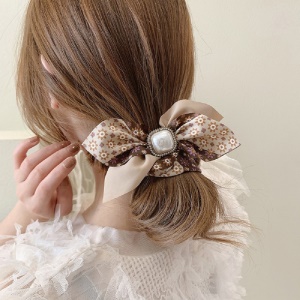 Attache cheveux avec perle