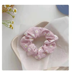 Attache cheveux motif fleuri