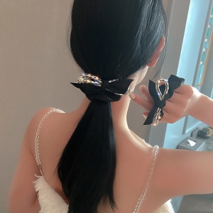 Boucle de cheveux arc flanelle