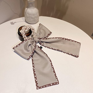 Chouchou de cheveux en dentelle avec décoration de perle