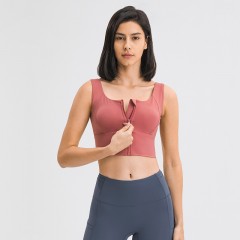Top stretch de sport à fermeture éclair