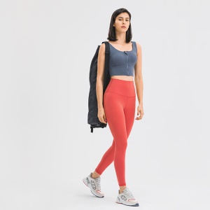 Top stretch de sport à fermeture éclair